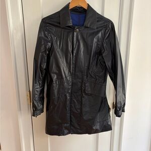 Men's or teens  Black Raincoat with Classic Collar from suit supply.
